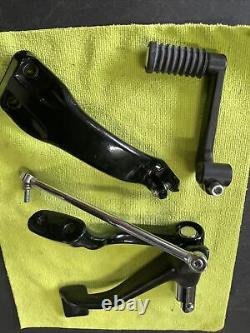 Harley 04-13 XL Sportster Oem Stock Black MID Foot Controls Used